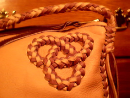  This is what I call a 'tri-loop' applique. Often people call it a Celtic knot. Some say 'infinity knot'. 