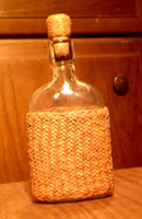 braided leather pineapple knot covered bottle