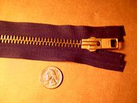 large brass zipper used for leather vests as well as purses and handbags