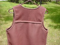 the braided back yoke of this western style leather vest 