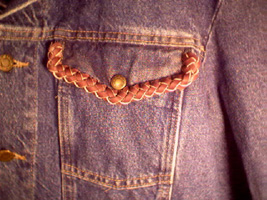 denim jacket with braided leather pocket flap