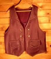  Here is the vest with the 'trick braided' snap closures attached for wearing it with an open front. 