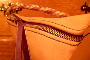 large brass zippers used for custom and handmade braided leather goods.