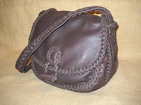  This picture is of a dark Brown purse. 