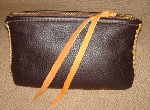 belt pouch made using leather braiding of moccasin cowhide that is made in America