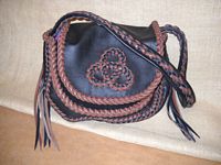  These two pictures are of the same bag - another of these custom handmade leather purses that is also completely braided. This one has dark Brown purse parts of two colors (dark Brown and Mahogany) used for the braiding. On the flap it has (what I call) a 'tri-loop applique'. 