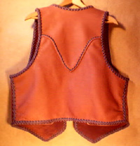  Here is a picture of the back of the vest showing it's long back yoke. 