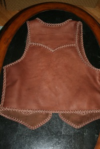  This picture shows the back of the vests, including it's pointed yoke. 